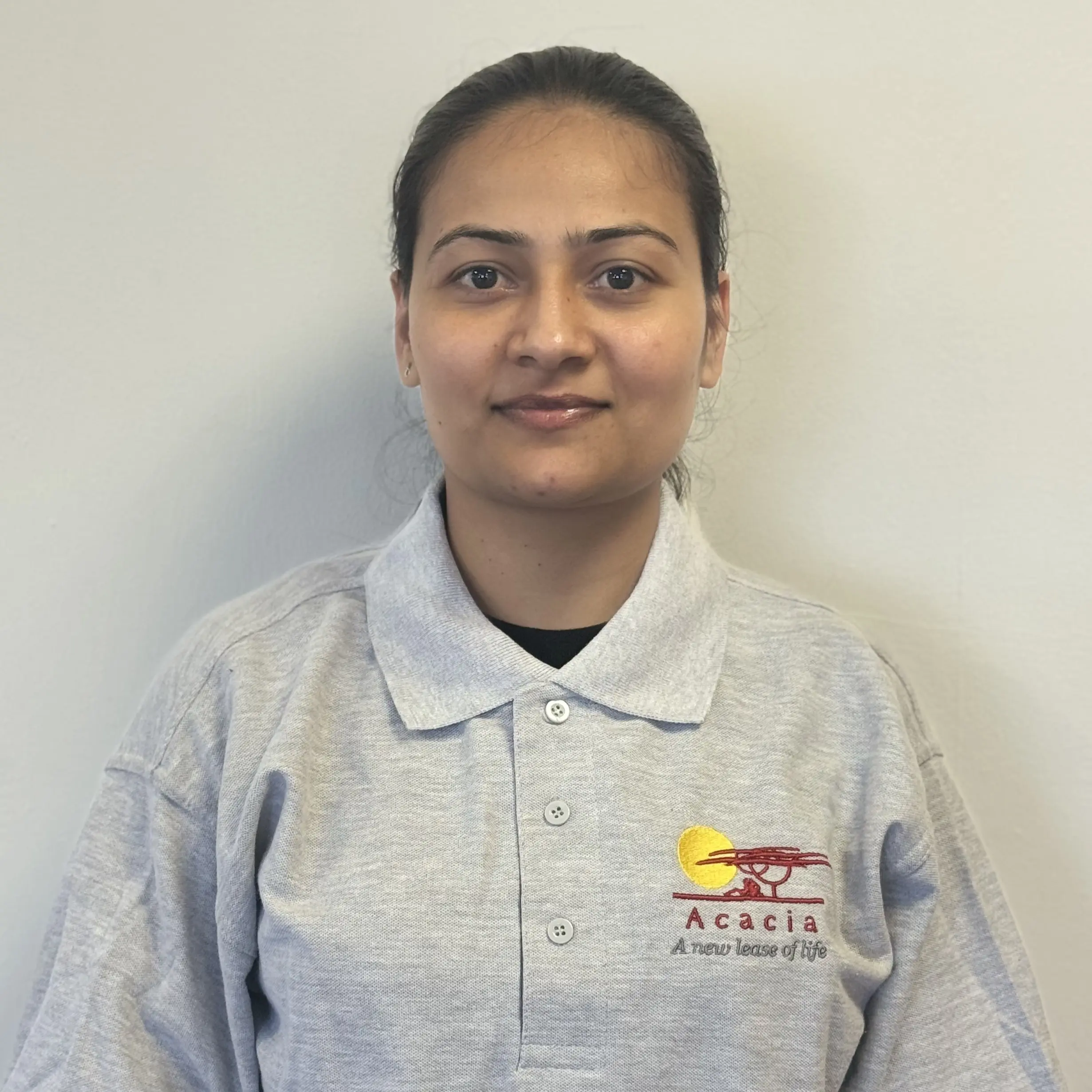 sandeep kaur in acacia homecare uniform.