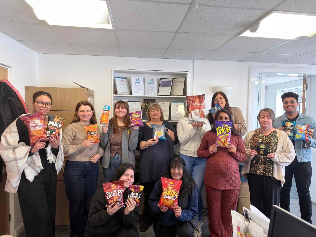 National Day at Acacia Homecare - Team Photo with their favourite crisps